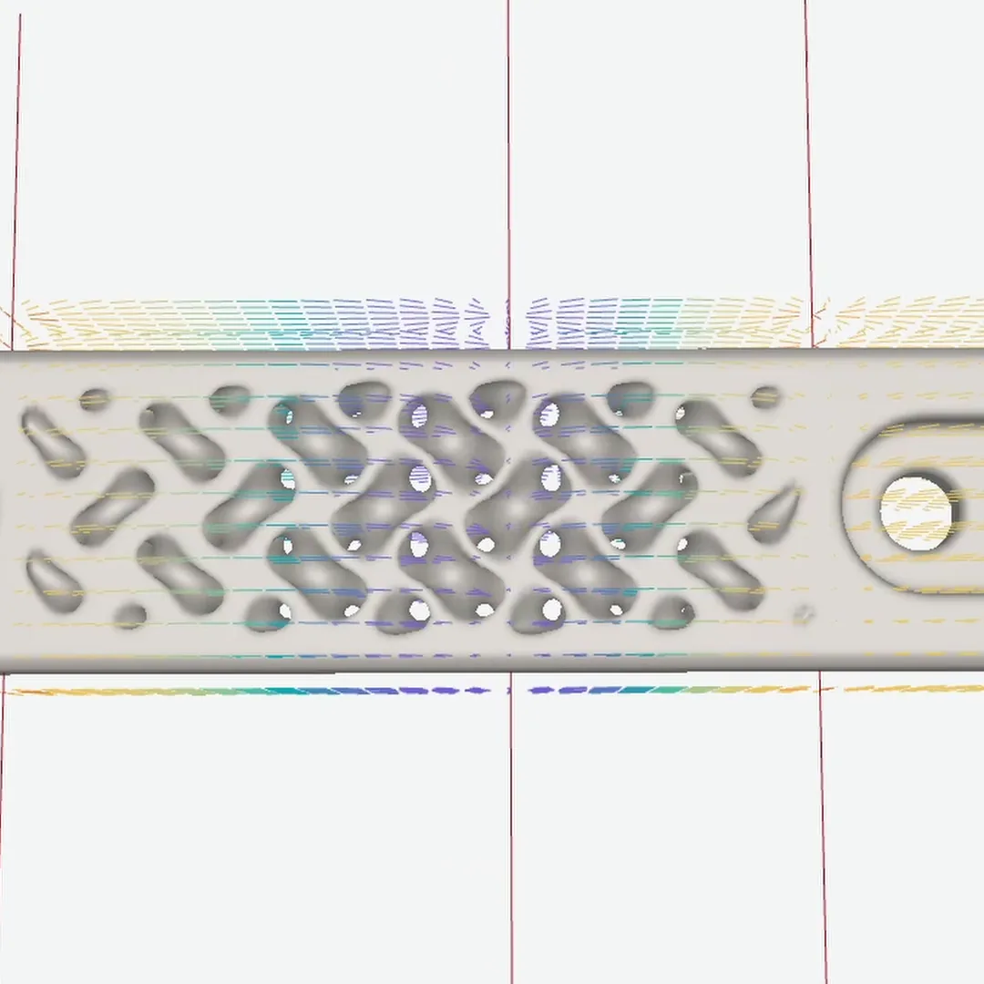 A graded TPMS beam driven by a field: the grading curve is edited, the field vectors update, and the lattice follows